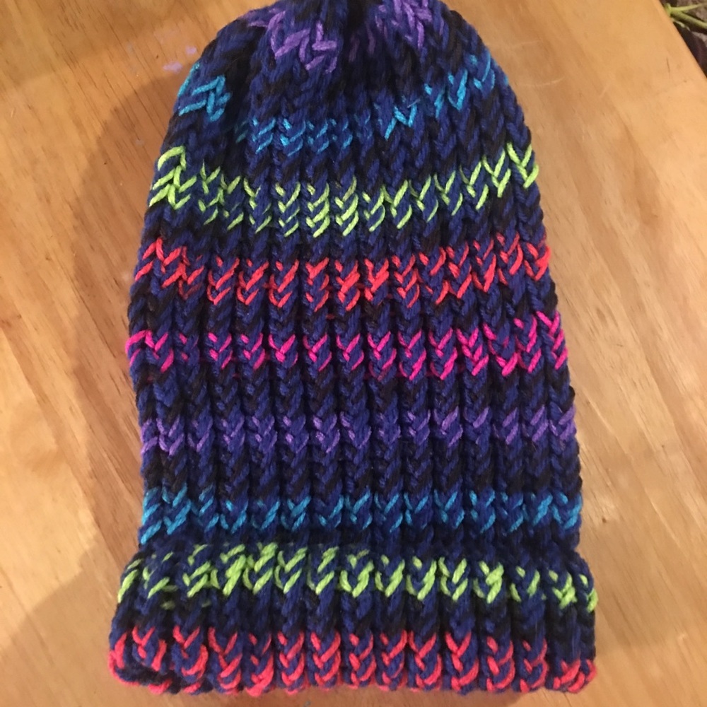 Homemade blue and rainbow knit hat